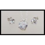 A stamped 925 silver necklace with a prong set cz