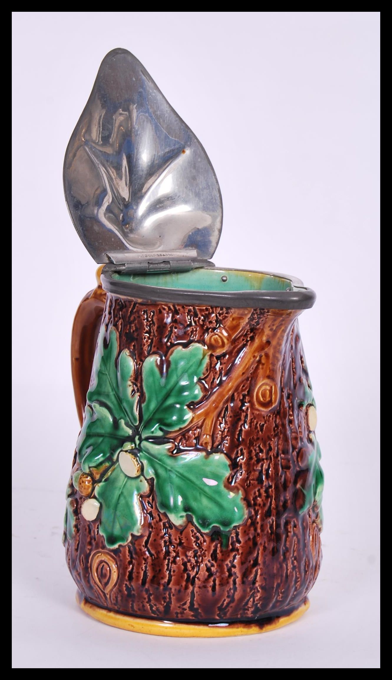 A 19th Century Victorian Majolica oak jug having a - Image 5 of 5