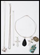 A selection of silver necklaces to include two cru