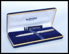 A stamped 925 silver ball point pen by Aurora, set