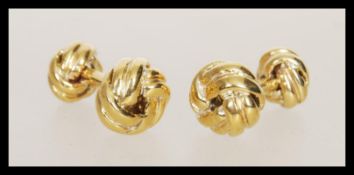 A pair of 18ct gold plated cufflinks having knot d