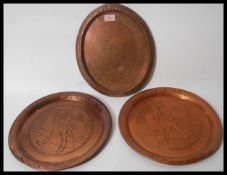 A set of three vintage early 20th Century pub adve