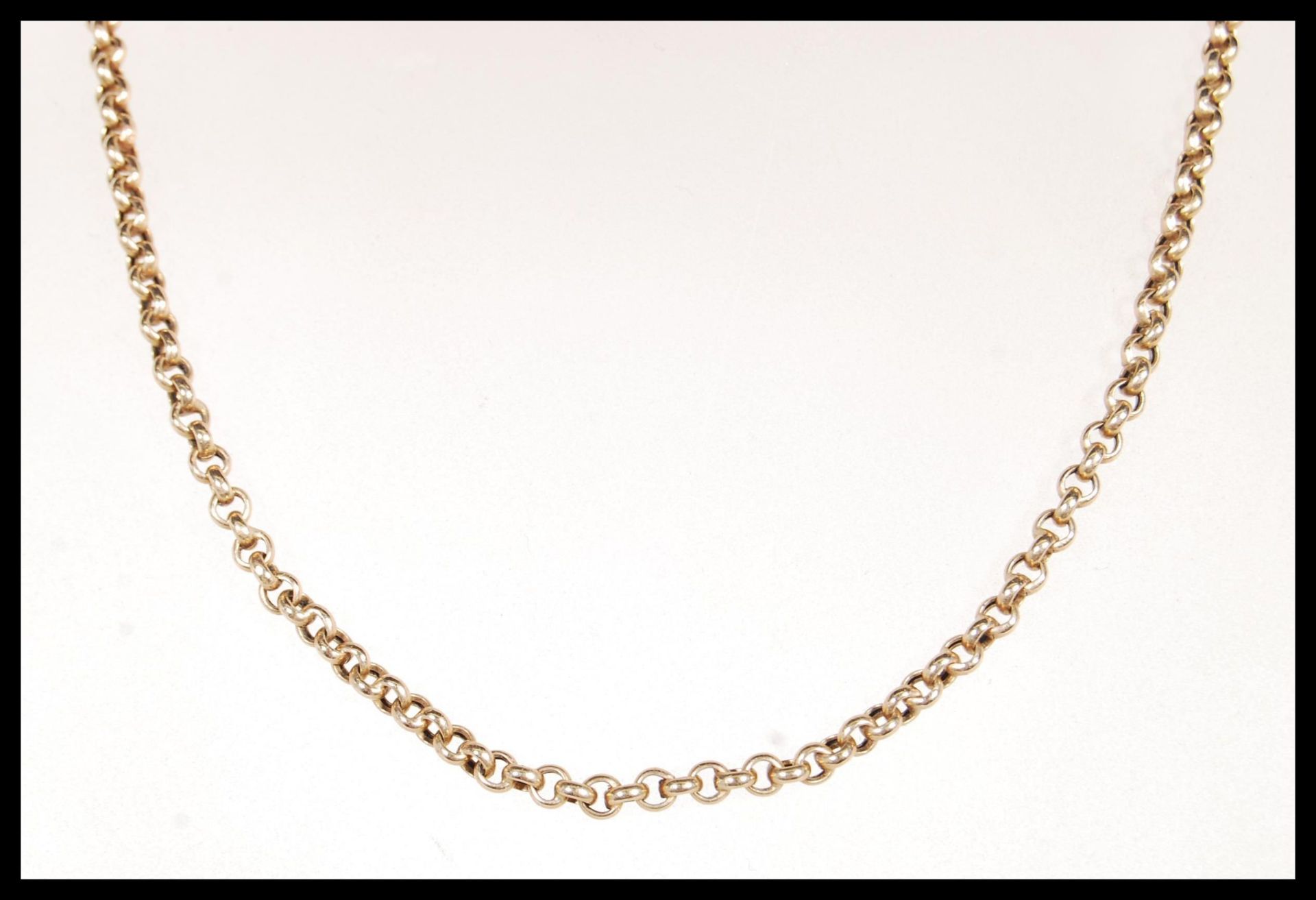 A stamped 375 9ct gold belcher link chain necklace having a spring ring clasp. Measures 16 inches.