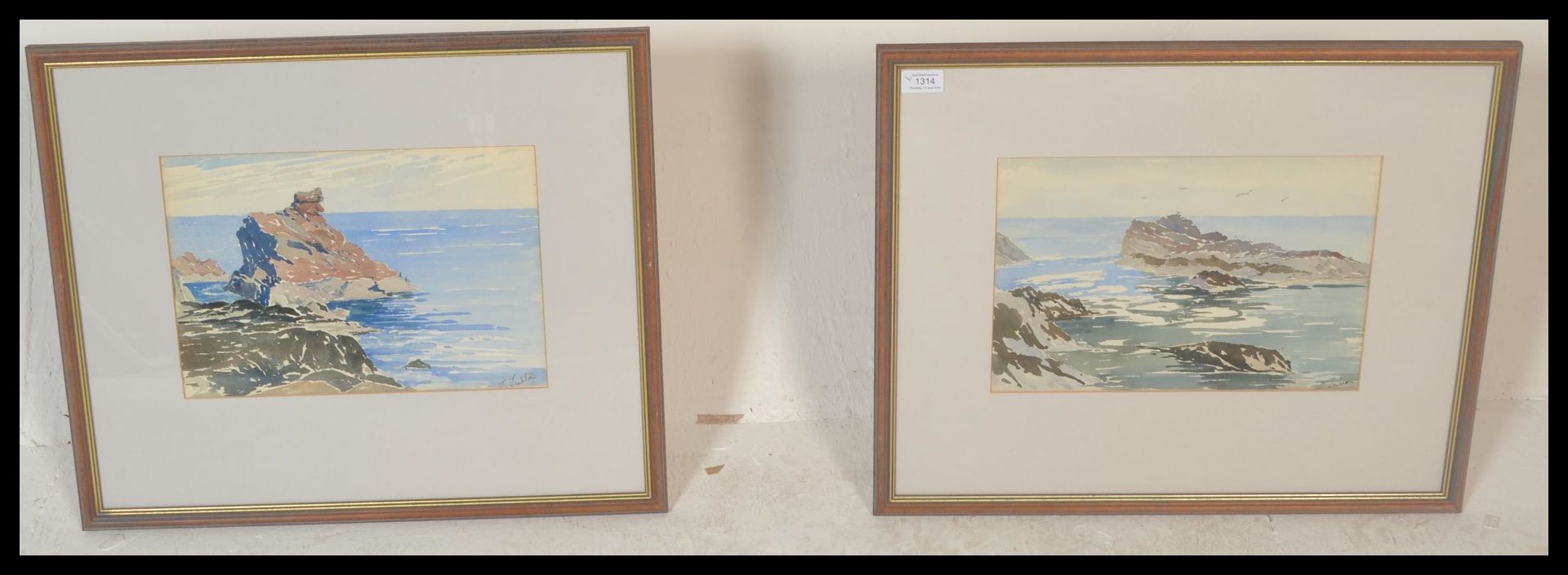 A pair of 20th century watercolour paintings of coastal rocky scenes being signed to the corner - Image 2 of 6