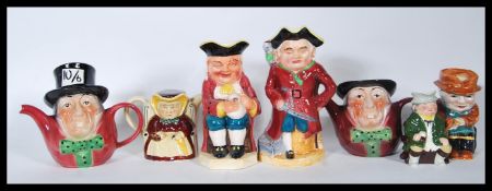 A collection of seven 20th Century ceramic Toby jugs to include examples by Toby Wood, Sylvac,