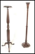 A 19th century Victorian large mahogany barley twist torchere  / plant stand being raised on a