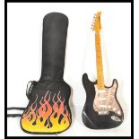 A Stratocaster style electric six string guitar Handcrafted in Cornwall by Ed Simons, having black