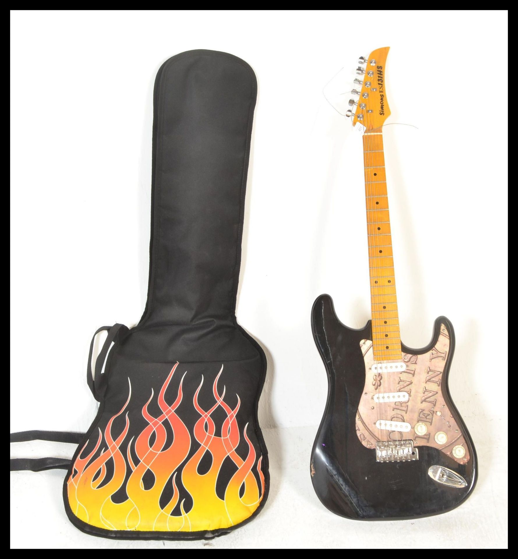 A Stratocaster style electric six string guitar Handcrafted in Cornwall by Ed Simons, having black