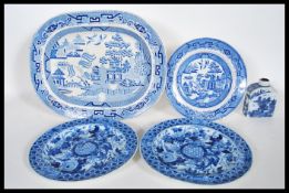 A group of 20th Century blue and white ceramic wares to include a Chinese inkwell having oriental