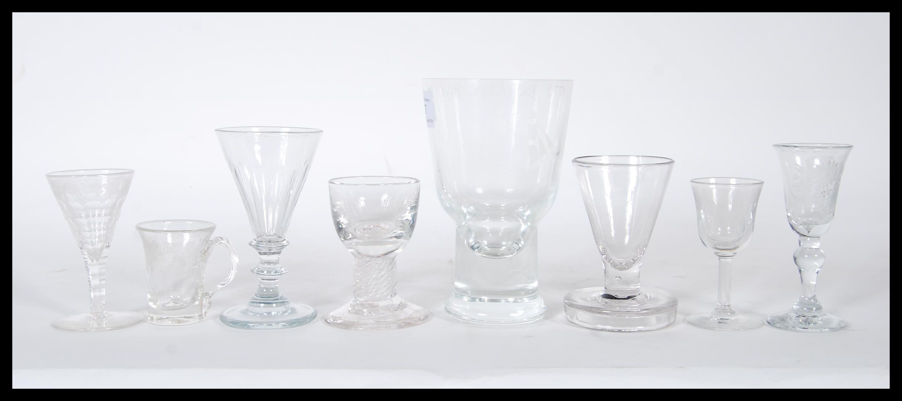 A collection of 18th and 19th century Georgian drinking glasses to include a trumpet bowl example on
