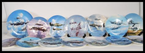 A collection of Coalport collectors plates, a run of Reach for the sky by Michael Turner to include,