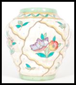 A early 20th Century 1930's Charlotte Rhead for Crown Ducal Trellis 6016 pattern flower vase, having