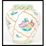 A early 20th Century 1930's Charlotte Rhead for Crown Ducal Trellis 6016 pattern flower vase, having