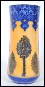 A early 20th Century Royal Doulton luster vase, having blue geometric patterns to top and bottom, on