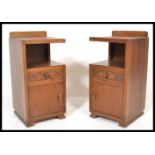 A true pair of early 20th Century circa 1940's oak bedside cabinets, each with a open recess with