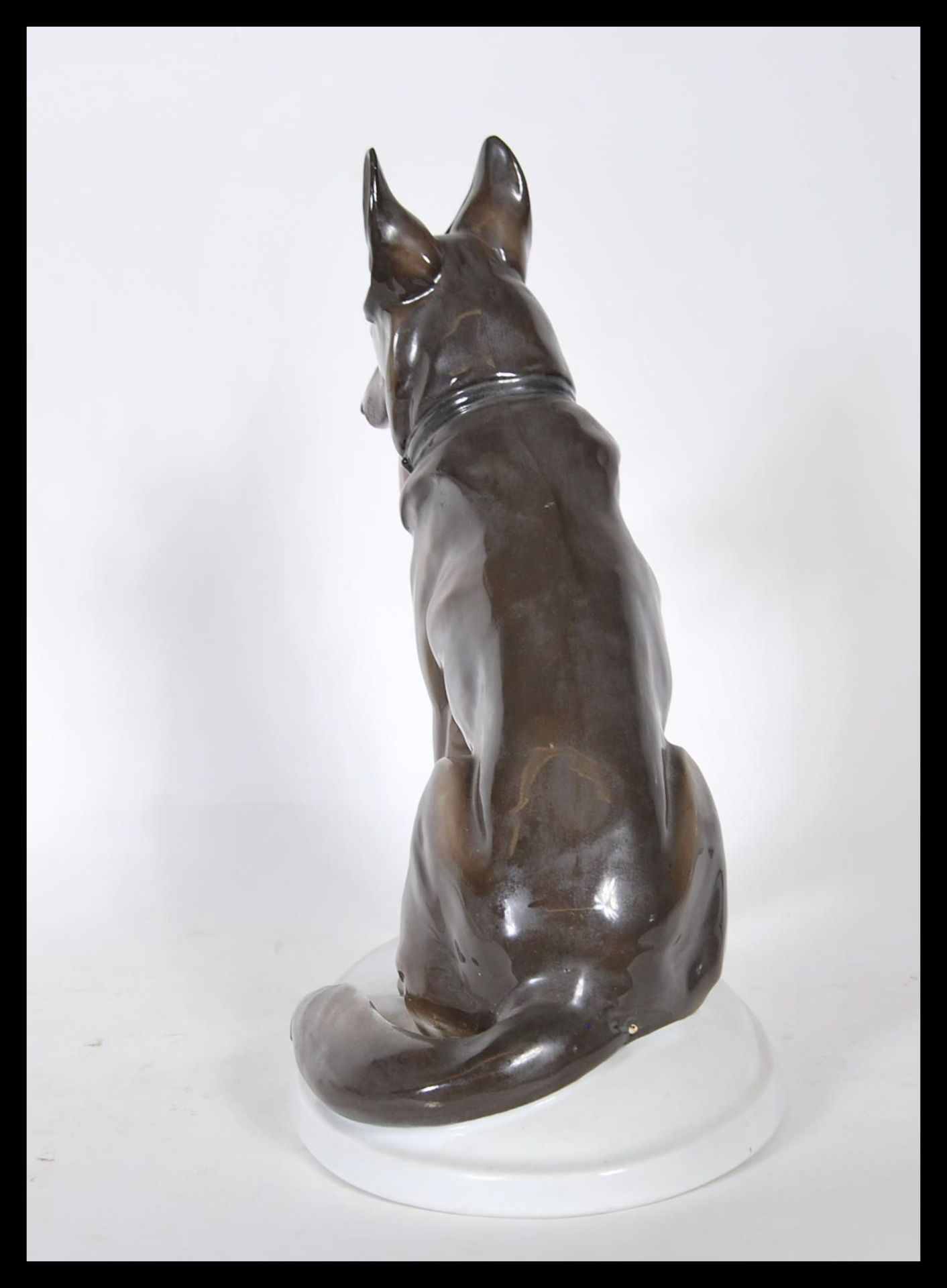 A vintage 20th Century Zsolnay ceramic figurine ( stamped  5566 ) modelled as a seated Alsatian / - Bild 4 aus 6