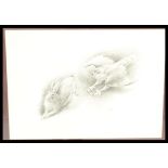 A framed and glazed pencil sketch of a Kestrel swooping with its talons out about to strike a