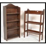 An early 20th Century Art Nouveau inspired open front oak waterfall bookcase with fitted shelves