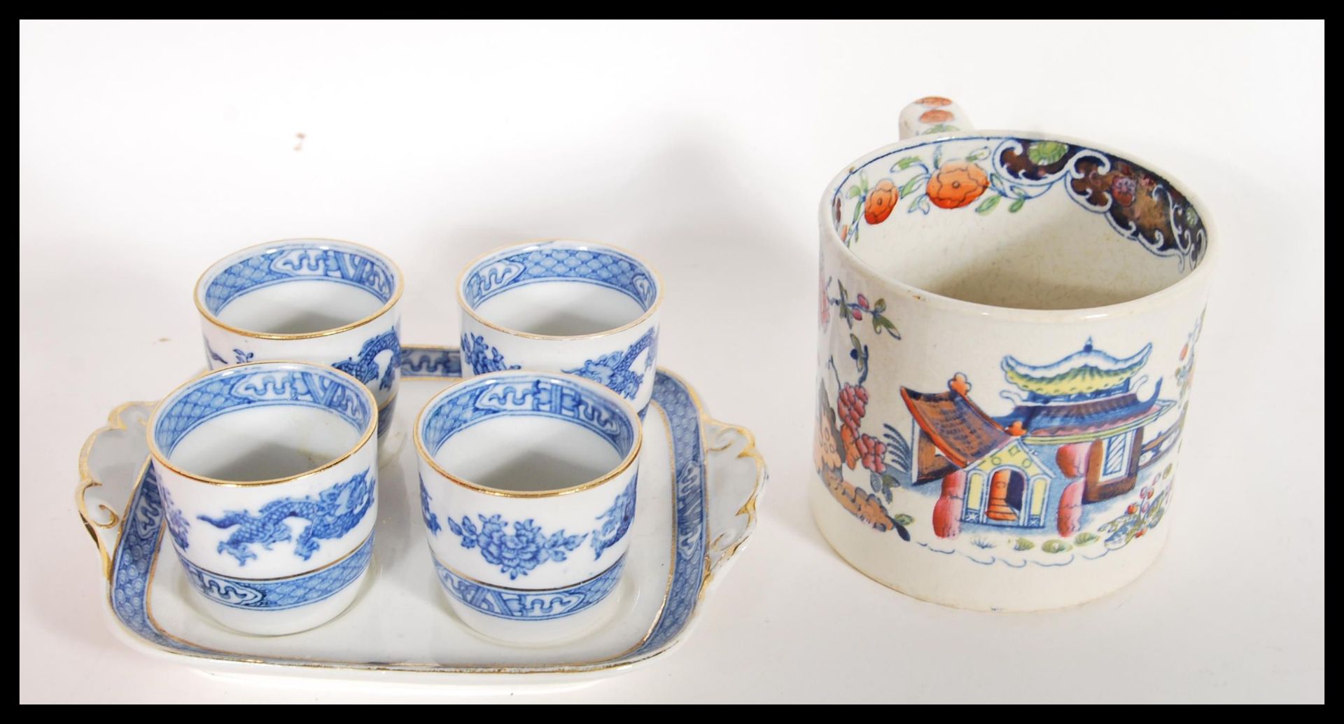 A collection of 19th Century Victorian Staffordshire mugs and cups, most having blue and white - Bild 13 aus 13