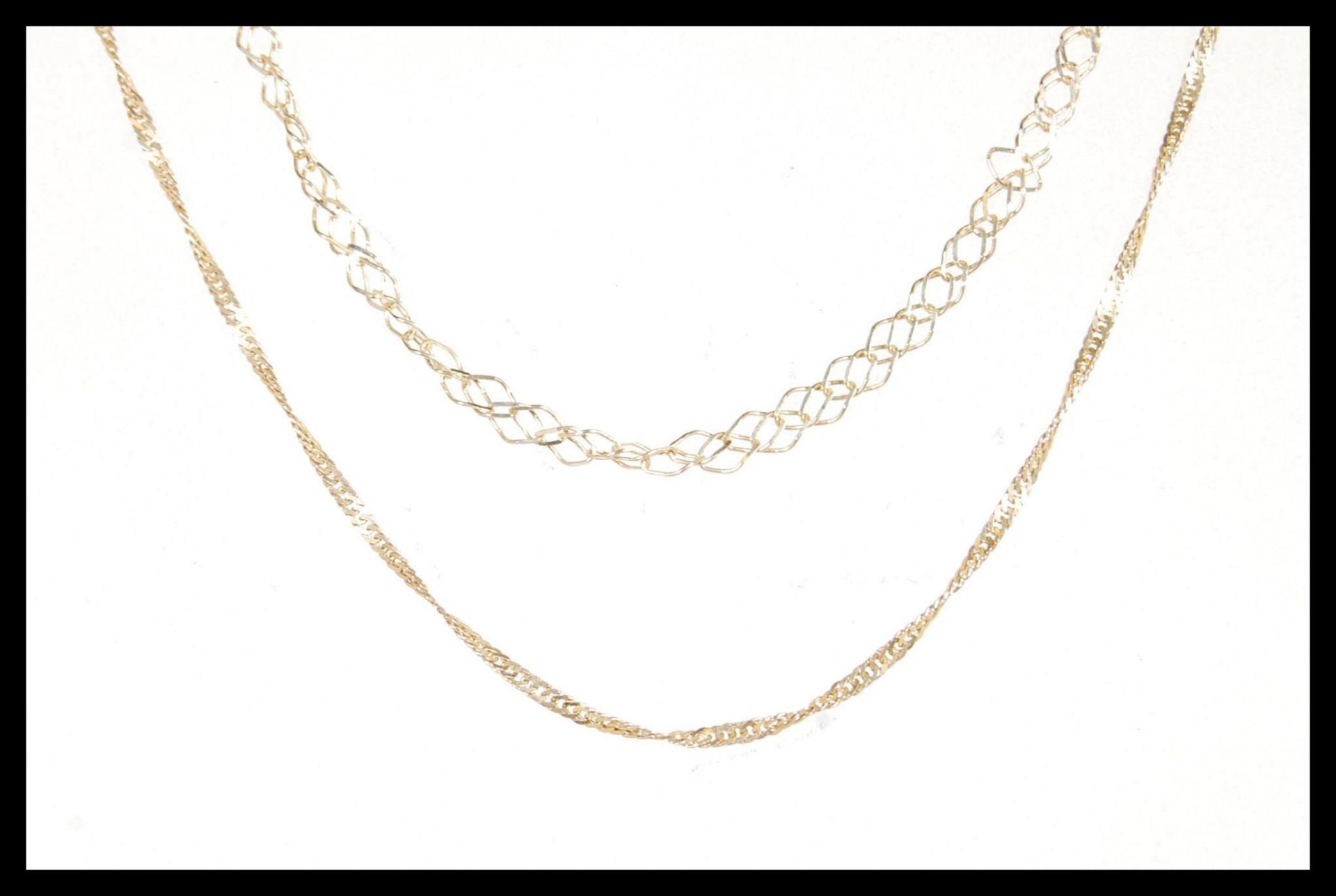 Two stamped 375 9ct gold necklace chains to include a fine link necklace chain along with a