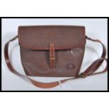 A vintage Mulberry chocolate brown scotch grain leather bag.  This handbag has front and interior