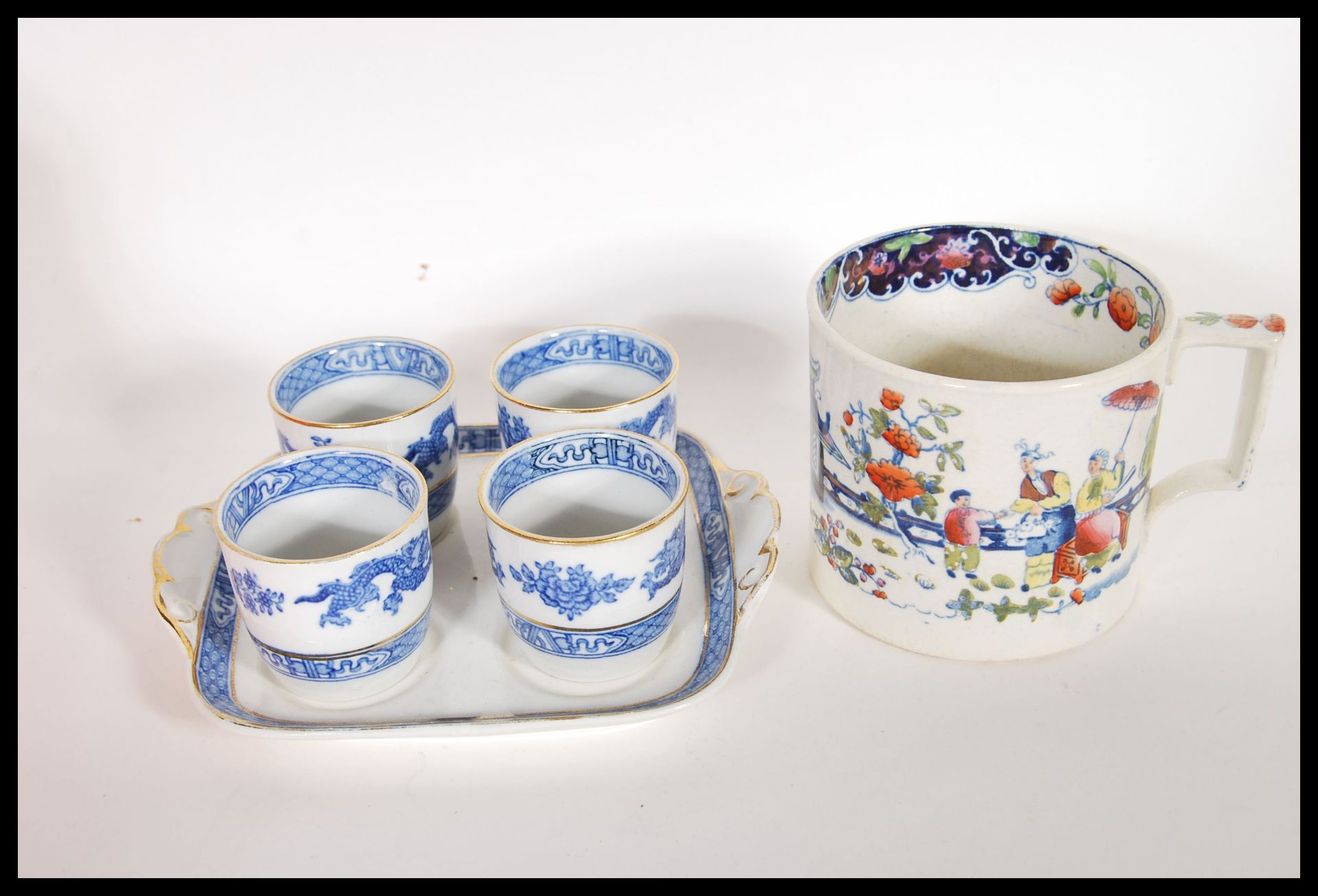A collection of 19th Century Victorian Staffordshire mugs and cups, most having blue and white - Bild 11 aus 13