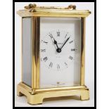 A Bayard French carriage clock with white enamel d