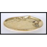 A late 19th Century Art Nouveau bronze dish / pentary, having leaf decoration and crab to one