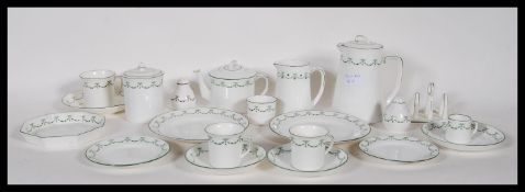 An early 20th Century Foley China breakfast service, pattern number 0387 decorated with green laurel