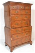 An 18th Century Queen Anne revival walnut inlaid and cross banded chest on chest of drawers /