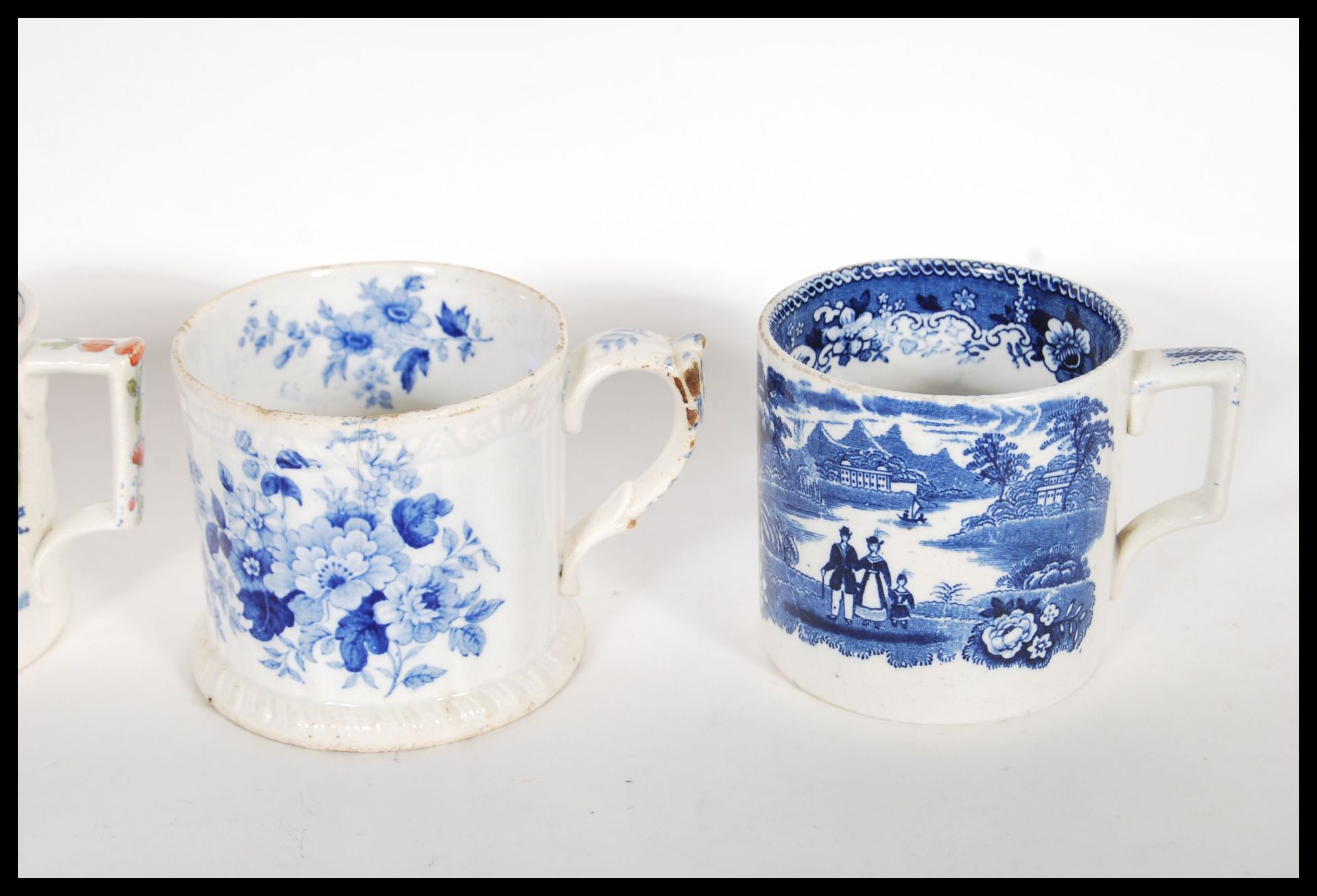 A collection of 19th Century Victorian Staffordshire mugs and cups, most having blue and white - Bild 8 aus 13