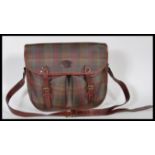 A vintage Mulberry plaid shooting style satchel / messenger bag.  This tartan check leather unisex