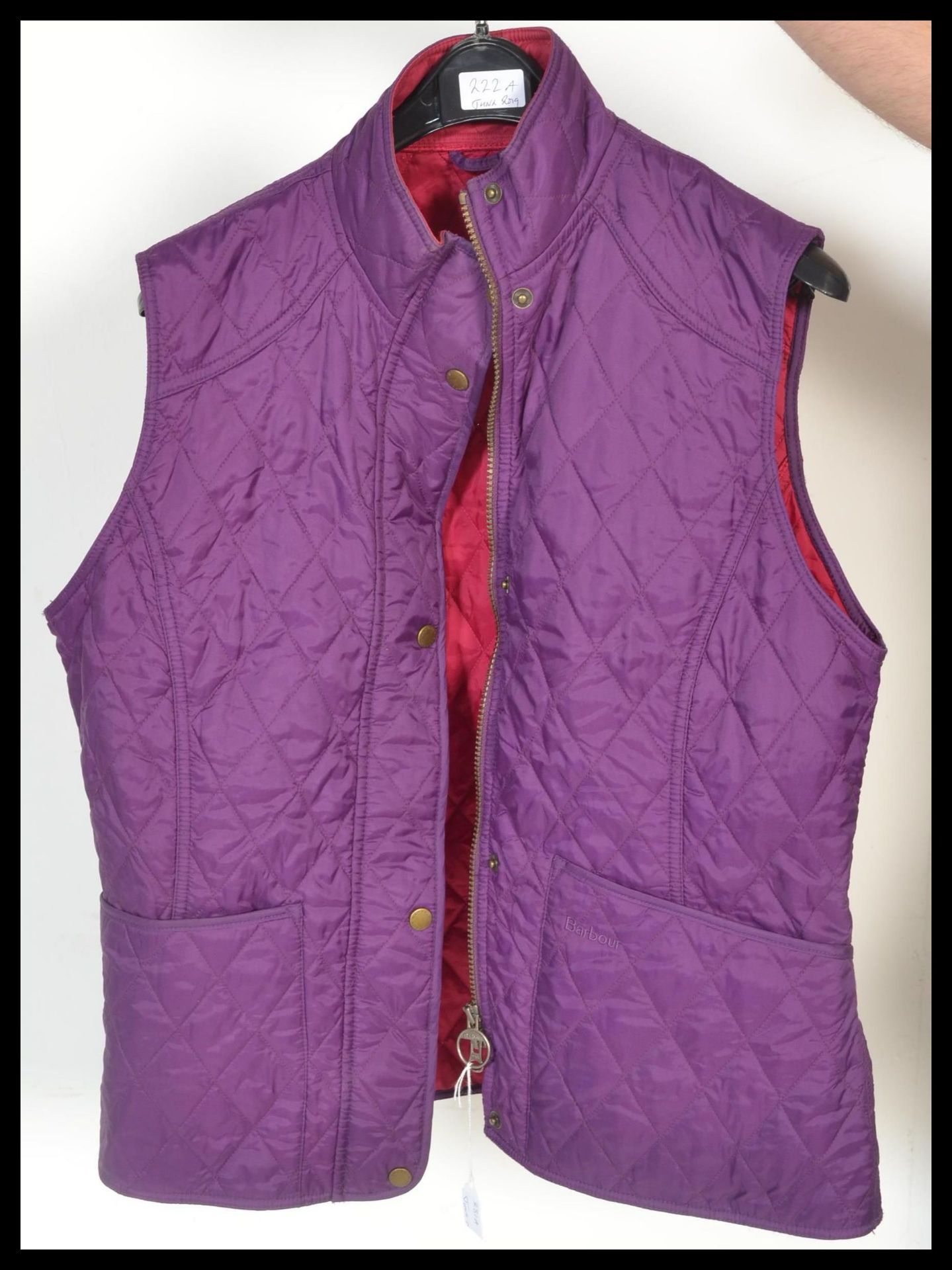 A ladies quilted Gilet by barbour, UK size 16, pockets to outside and in with original Barbour label