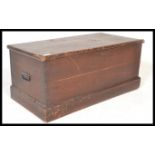 A 19th Century Victorian pine blanket box chest, hinged top with open storage, carry handles to