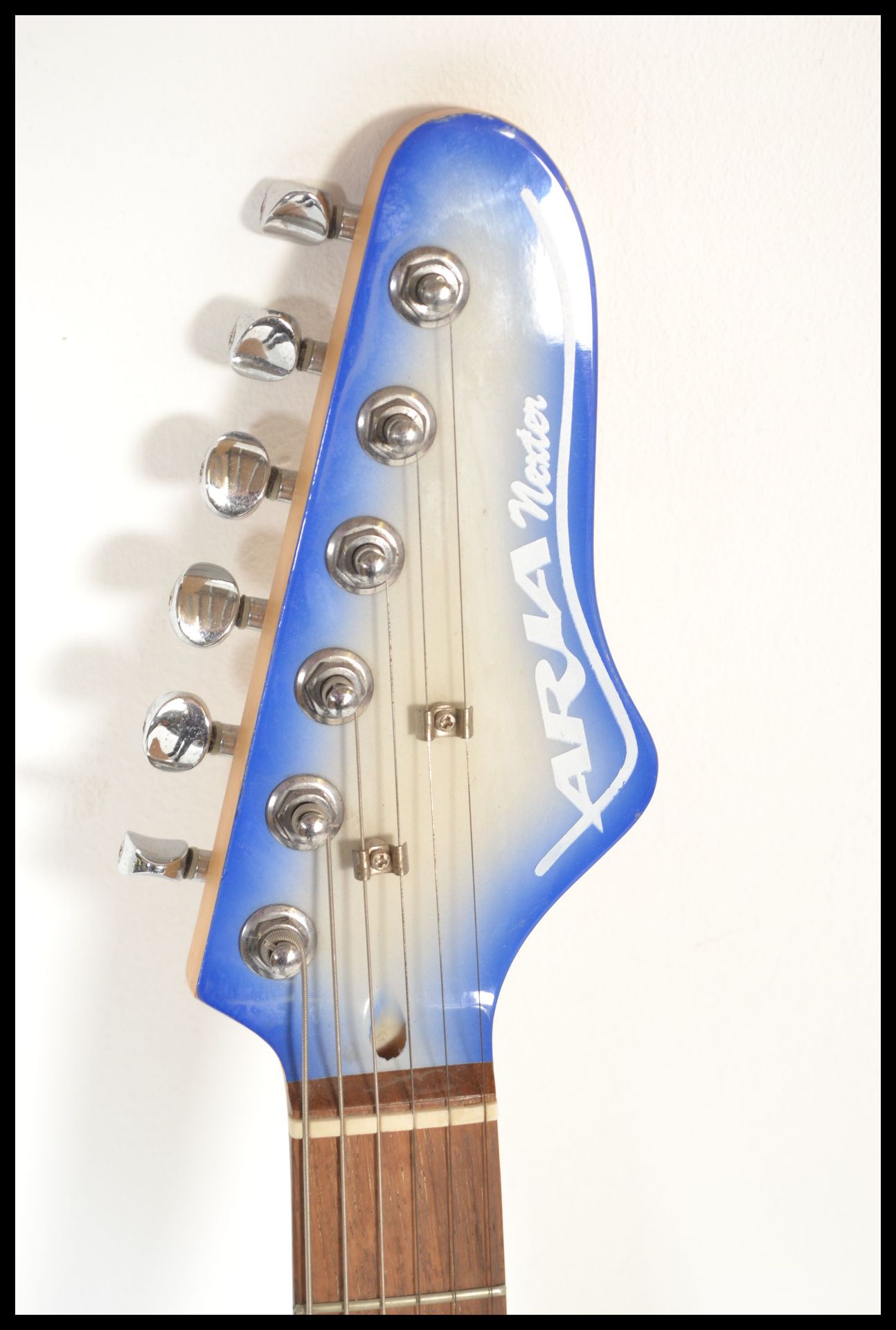 An Aria Nextar six-string STG Series electric guitar, sky blue sunburst body with white scratch - Bild 2 aus 4