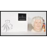 A Royal Doulton character jug depicting Her Majesty Queen Elizabeth II D7256 , handle modelled as