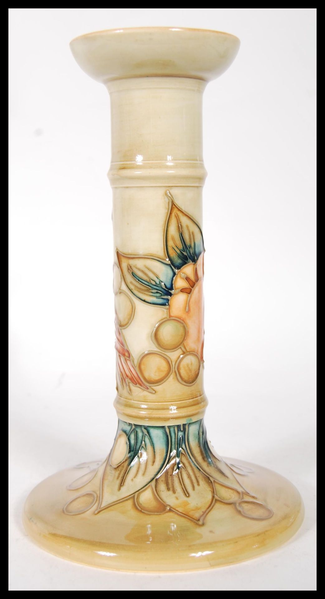 A Moorcroft pottery tube lined pedestal candlestick, decorated with a bird amongst fruit, - Image 3 of 6