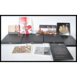 A collection of Royal Mint uncirculated coinage to include, two 2008 Royal Shield of Arms/ Emblems