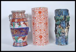 A group of three 20th Century Chinese vases, a hexagonal shape vase having white ground floral and