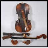 A late 19th/ early 20th Century Violin in pieces, having two piece maple back and spruce front with.