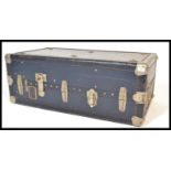 An early 20th century travelling compactum trunk by Ermette, carry handles to sides with clasps