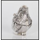 A stamped 925 silver vesta case in the form of a bird having match striker to base. Weighs 21.3g.