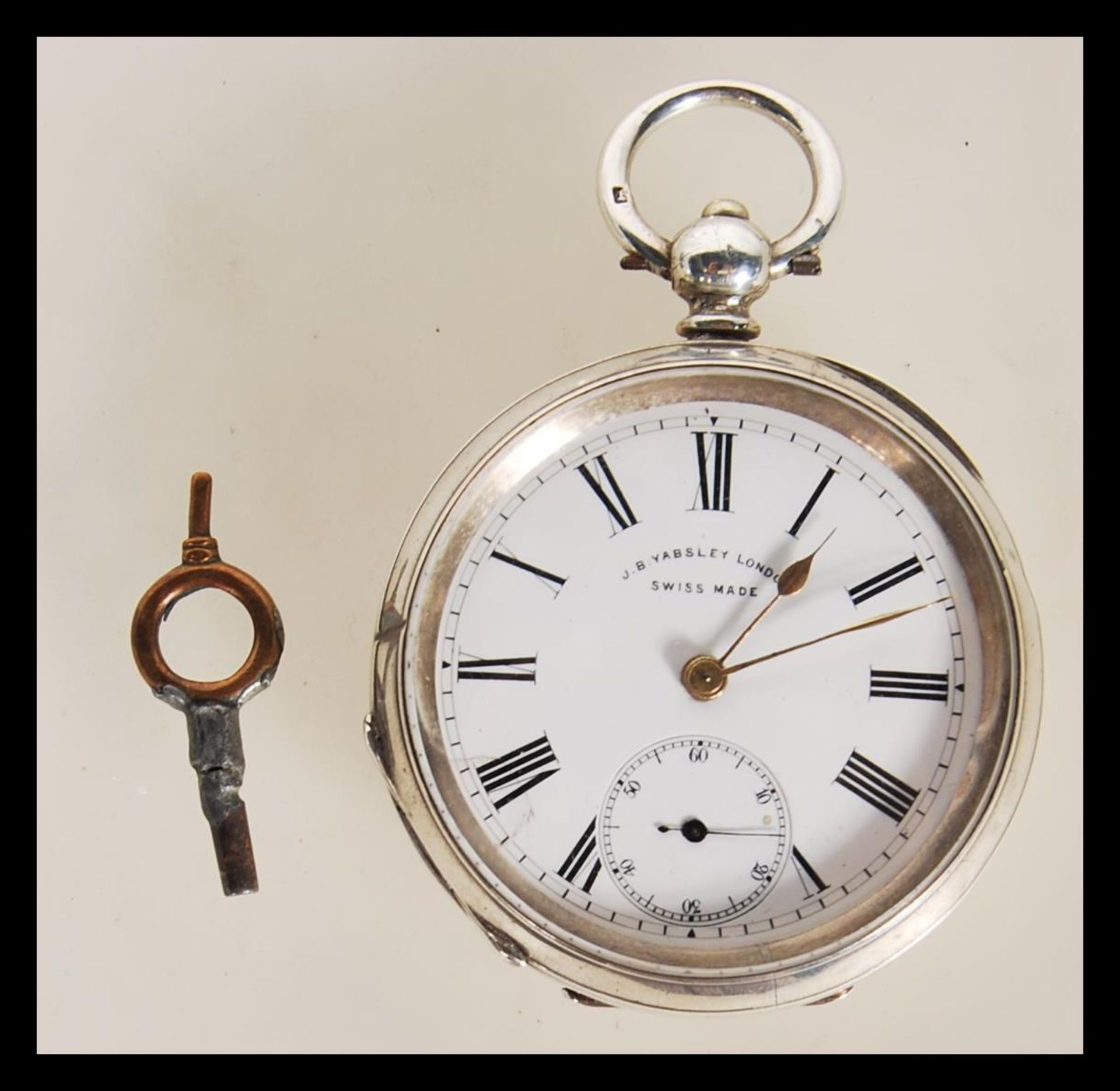 An early 20th century 935 silver Swiss pocket watch  being marked for JB Yabsley of London. Open