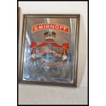 Two 20th Century pub advertising mirrors, one being for Martini Vermouth vino set within a pine