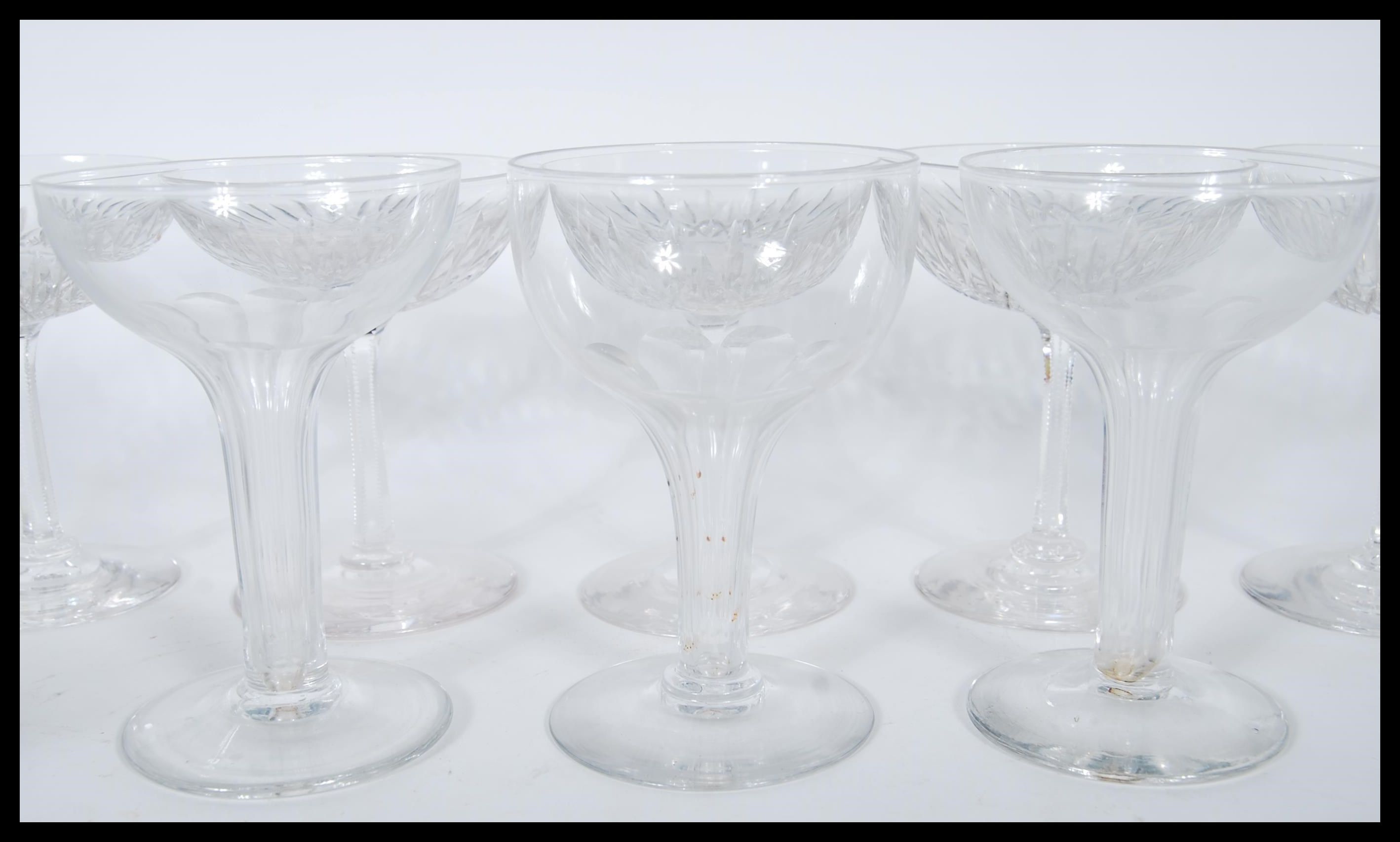 A collection of 19th century / early 20th century champagne glasses, the bowls set on tall stems - Image 4 of 5