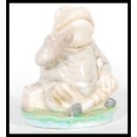 A 20th Century believed Beswick prototype ceramic figure of jeremy Fisher sitting on a lillypad.