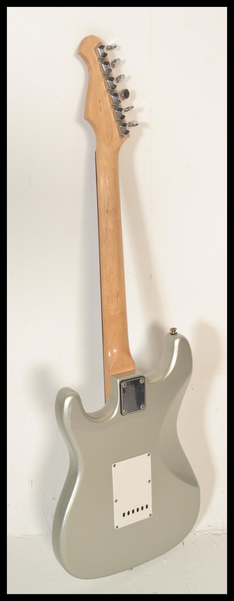 An Aria six-string STG Series electric guitar, silver body with white scratch guard and pick up. - Bild 5 aus 5