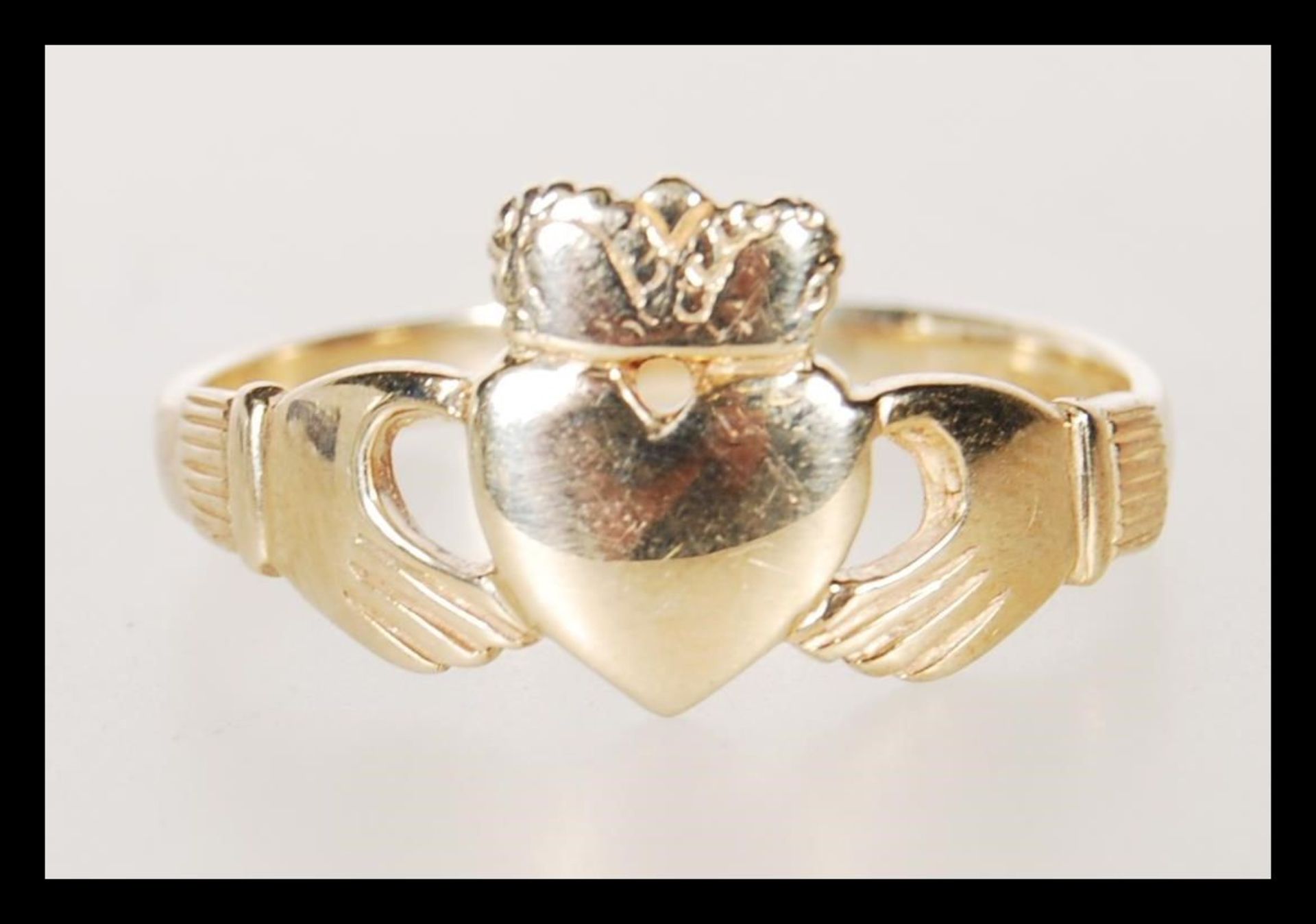 A 9ct gold hallmarked Welsh gold Claddagh ring. Hallmarked Birmingham. Weight 3.6g. Size X.5.