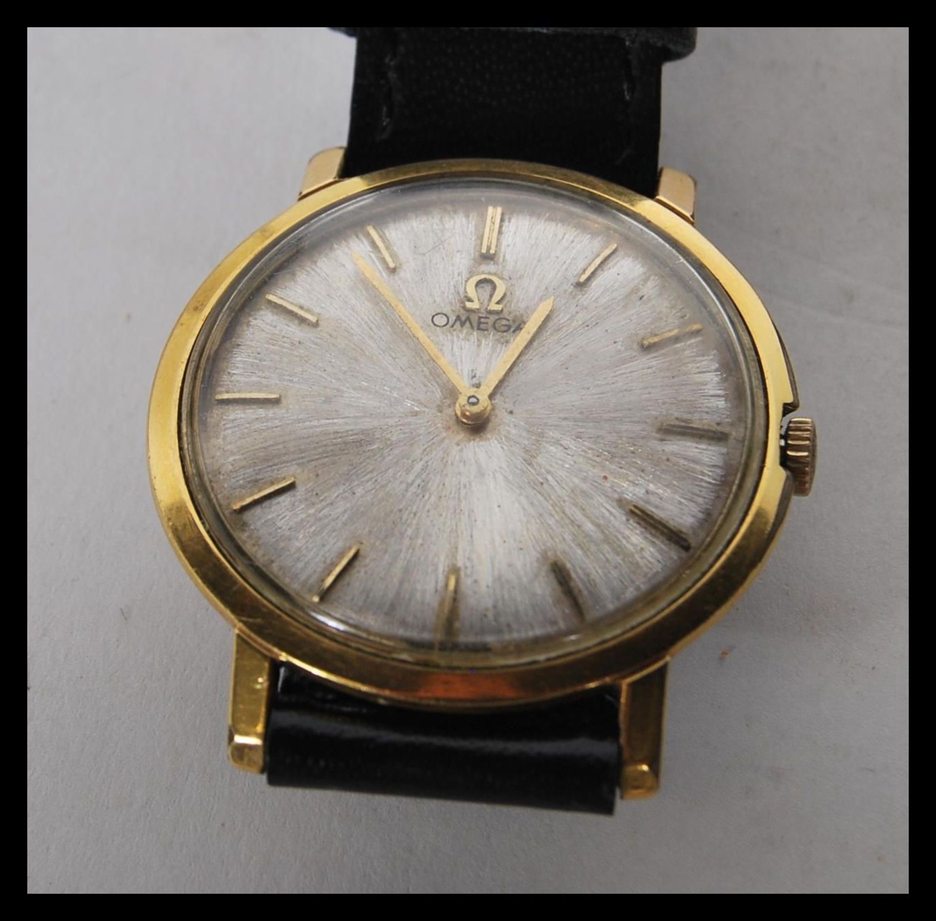 A vintage 20th Century gilt cased Omega mechanical wrist watch, gilt baton markers with a mother - Image 3 of 7