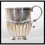 A 19th Century Victorian silver hallmarked Christening cup having gadrooned decoration and a